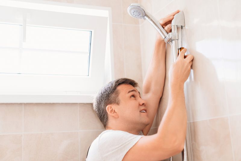 Plumber Working on Shower